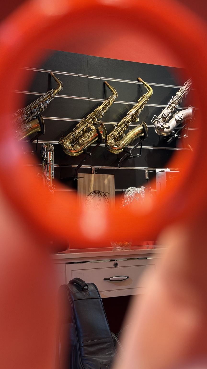 Saxophones at Saxophone Institute seen through a SAXELIER ligature